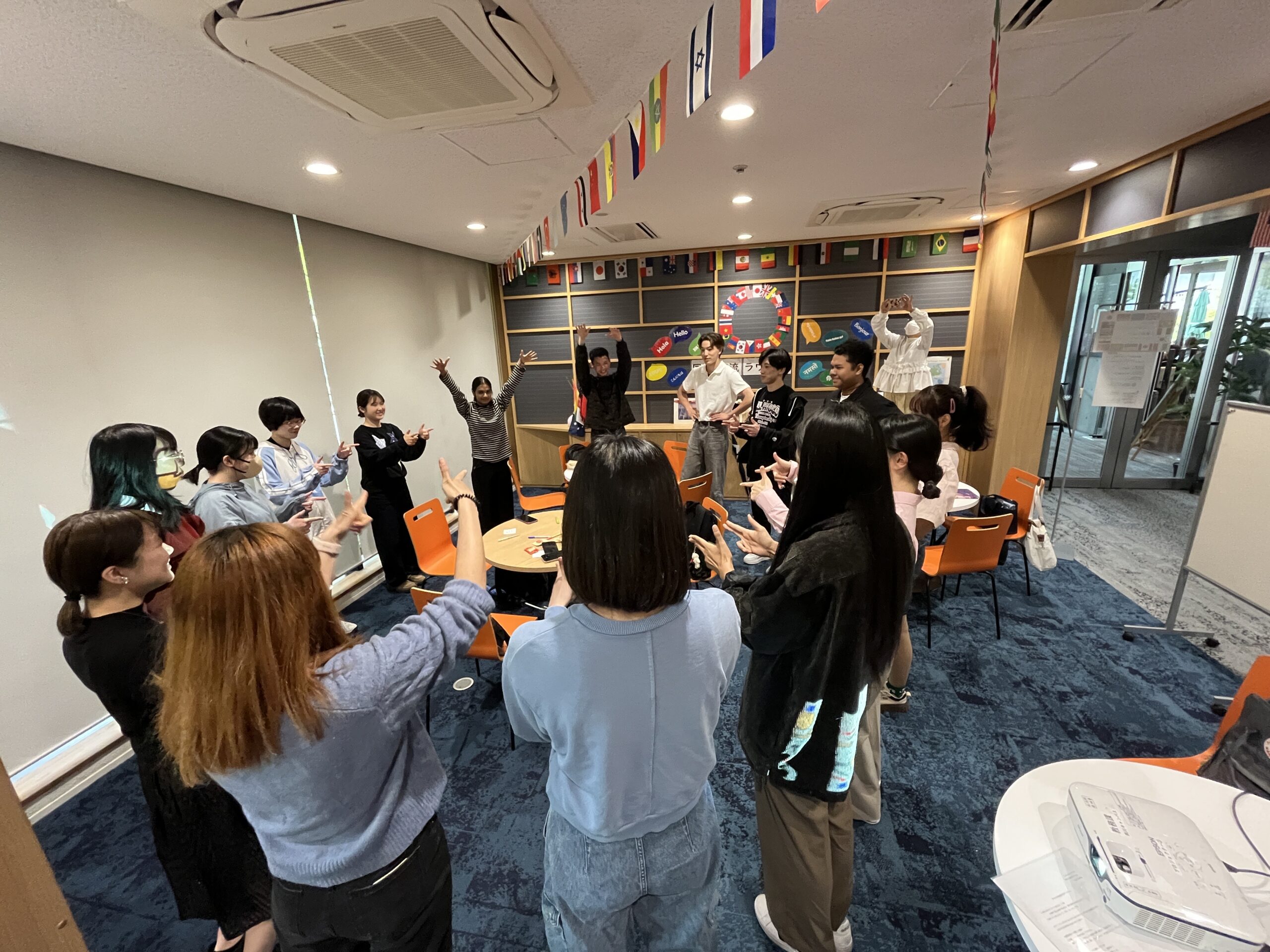 All participants form a circle and play Myanmar Janken.