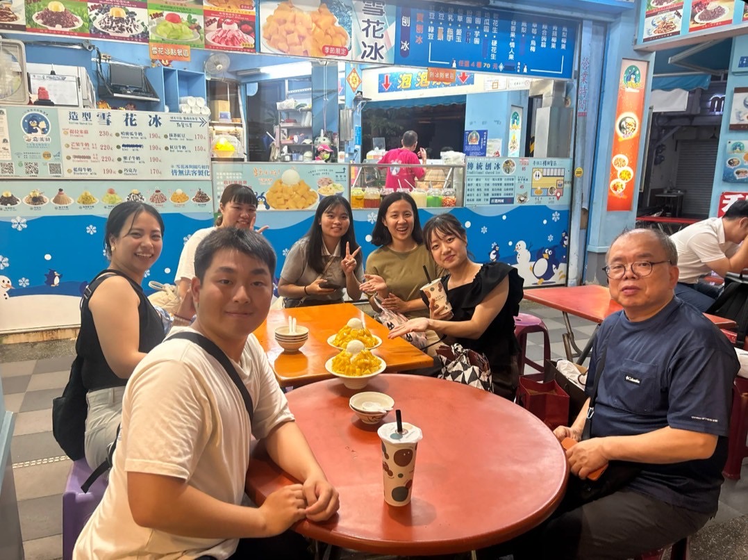 Enjoying the night market with local students