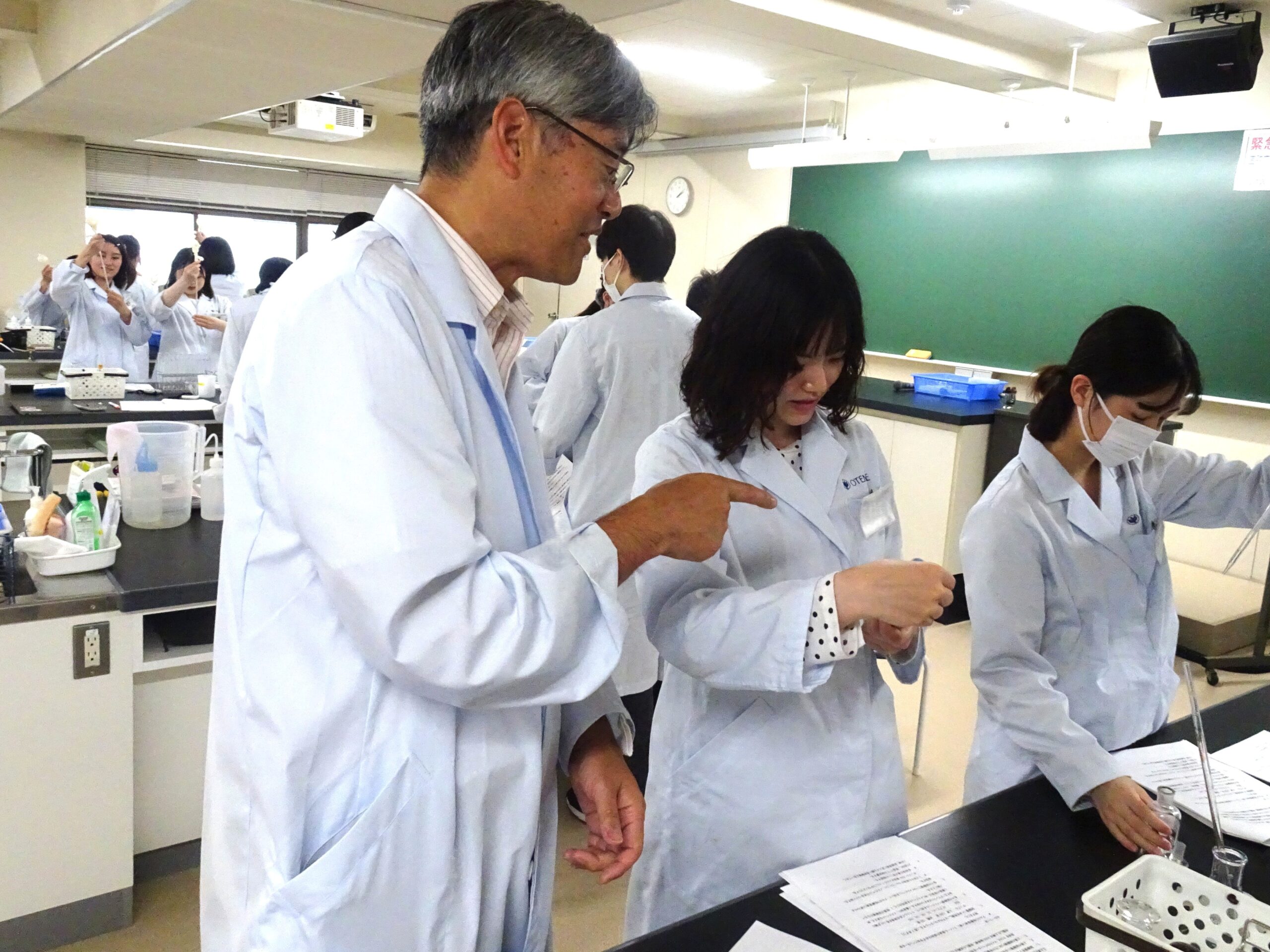 We are carefully separating the components of the egg white while checking the procedure.